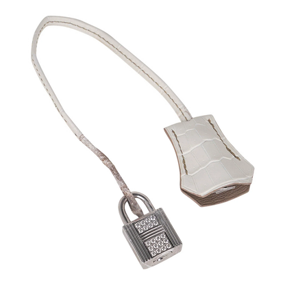 Gradient Pale Ivory Taupe Scaled Medium Structured Trapezoid Tote With Crystal Inlaid Silvery Hardware And Stone Embellished Suspended Metal Padlock Charm